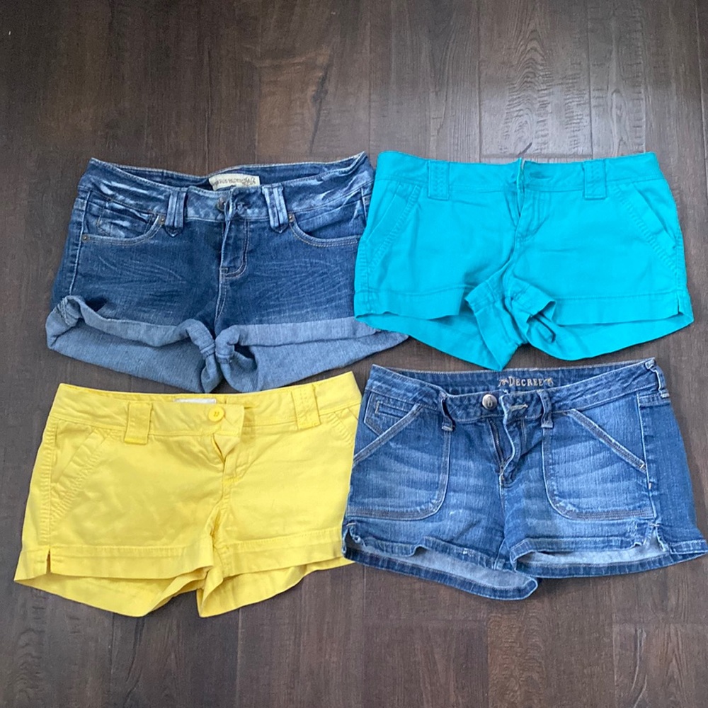 4 pairs of shorts! All size 7! Teal, yellow, and blue jean